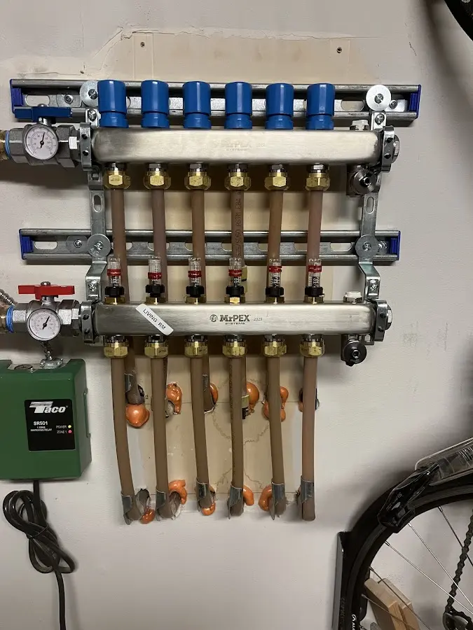 Plumber performing Water Heater Repair at a residential property in Clarksburg